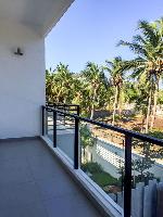 The balcony from the first floor bedroom.

This balcony looks out on to the wide open space on the east side of the land and is an ideal place to catch the sea breeze that sets in during afternoons and evenings.